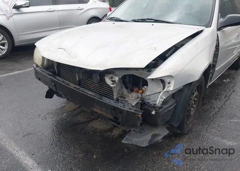 2001 Toyota Corolla Le z USA, uszkodzony, nr VIN 2T1BR12EX1C486482